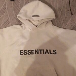 Cream Colored Essentials Hoodie